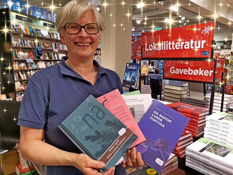 Det lokale salgsbordet midt i Norli-butikken til Hilde Røe på Kongssenteret rommer et 30-talls titler. Stor bredde preger utvalget, og to store forfattere er med på å brøyte vei for mange av de andre.