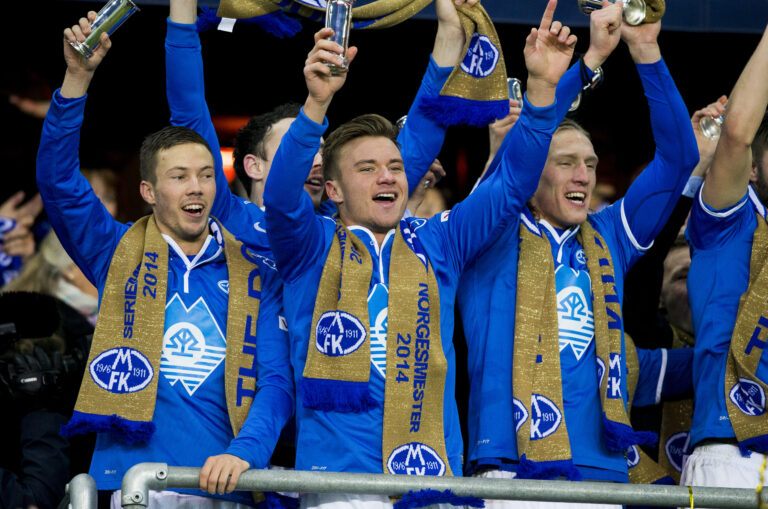 NM-fotball, cupfinale menn 2014: Martin Linnes (f.v.), Fredrik Gulbrandsen og Per-Egil Flo jubler etter ha vunnet cupfinalen i fotball mellom Molde og Odd på Ullevaal stadion. Molde vant finalen 2-0.