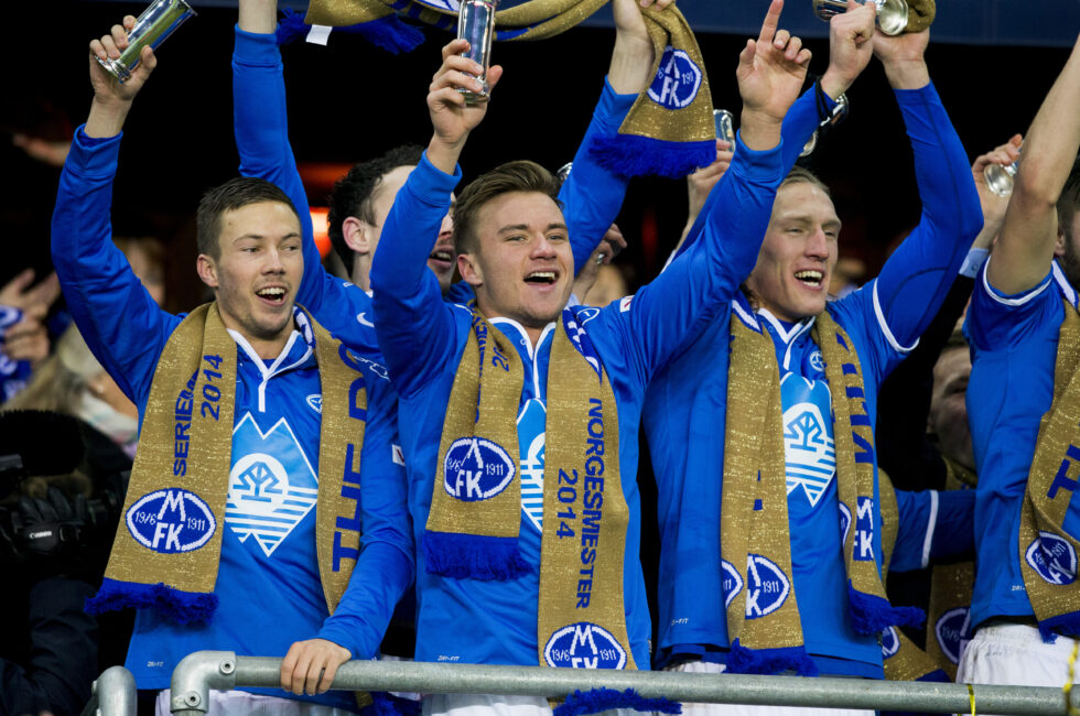 NM-fotball, cupfinale menn 2014: Martin Linnes (f.v.), Fredrik Gulbrandsen og Per-Egil Flo jubler etter ha vunnet cupfinalen i fotball mellom Molde og Odd på Ullevaal stadion. Molde vant finalen 2-0.