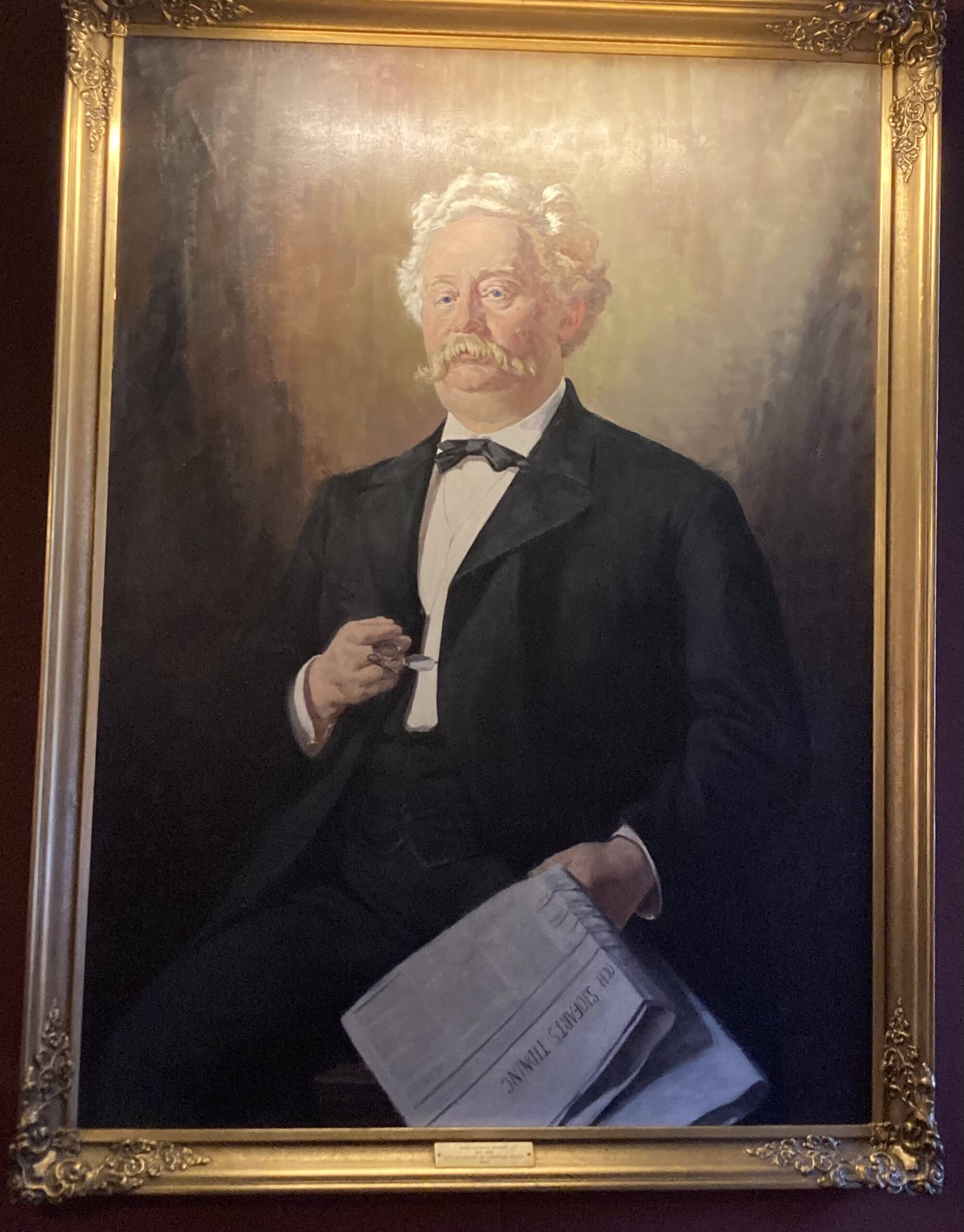 Maleri av statsråd Hans Rasmus Astrup. Bildet henger på veggen utenfor Kavlisalen i andre etasje.